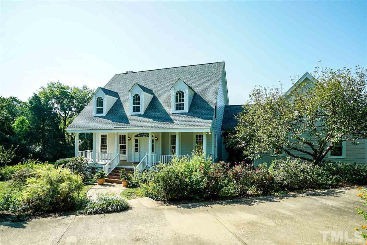 1325 Farmview Road Hillsborough, NC 27278 - Photo 2 of 25 a front view of a house with a yard