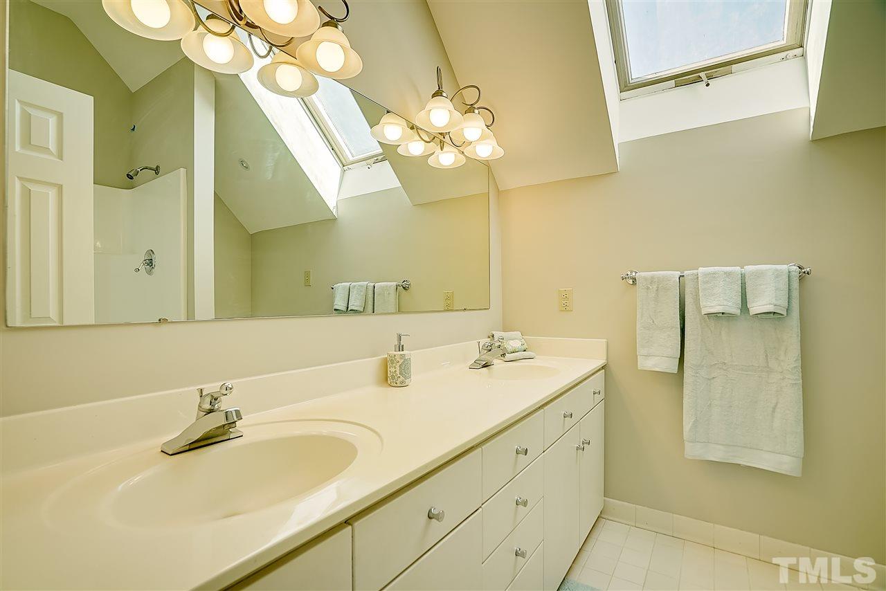 1325 Farmview Road Hillsborough, NC 27278 - Photo 15 of 25 a bathroom with a sink vanity and a mirror