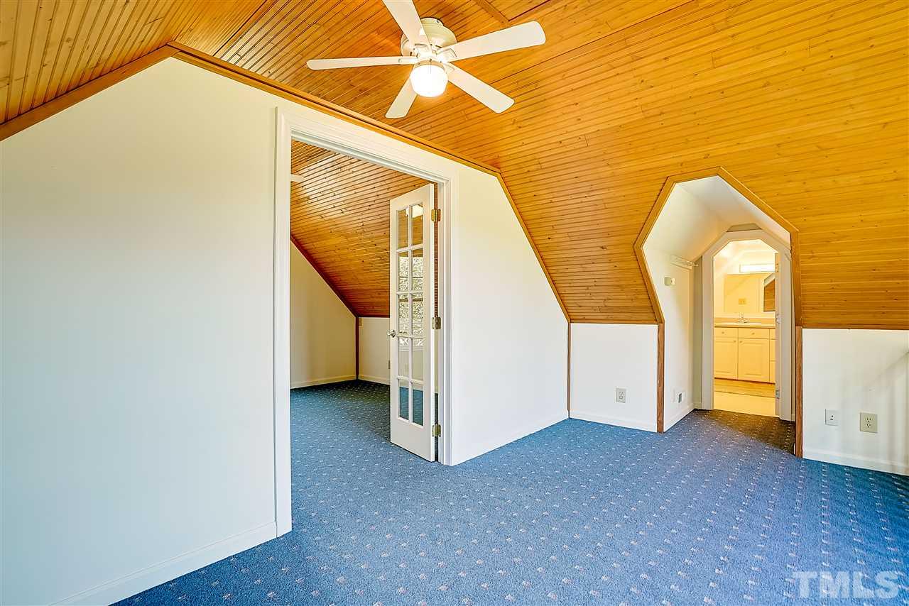 1325 Farmview Road Hillsborough, NC 27278 - Photo 19 of 25 a view of a room with wooden floor