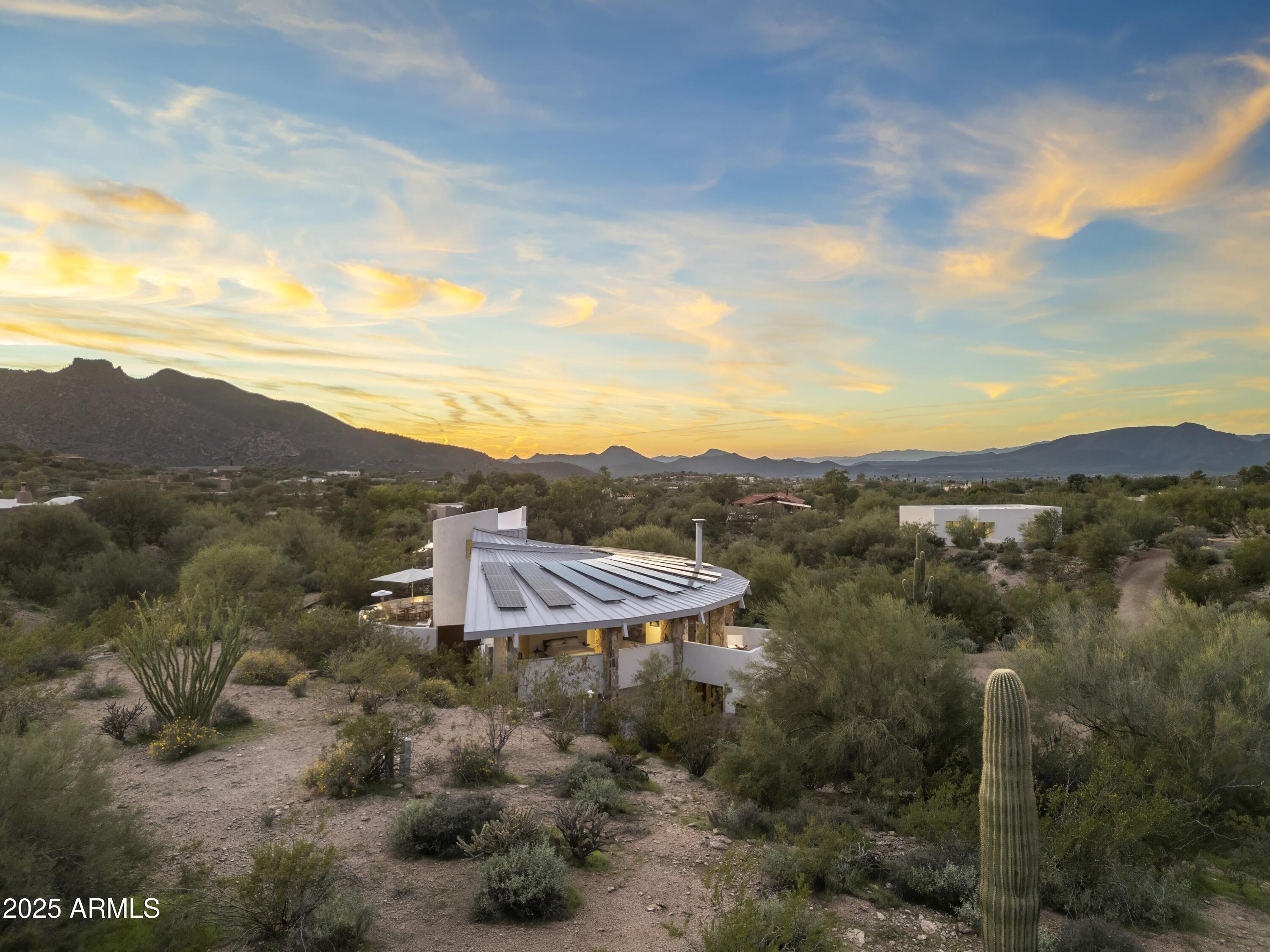 7915 East Primrose Path Carefree, AZ 85377 - Photo 12 of 55 a view of a mountain with an outdoor space