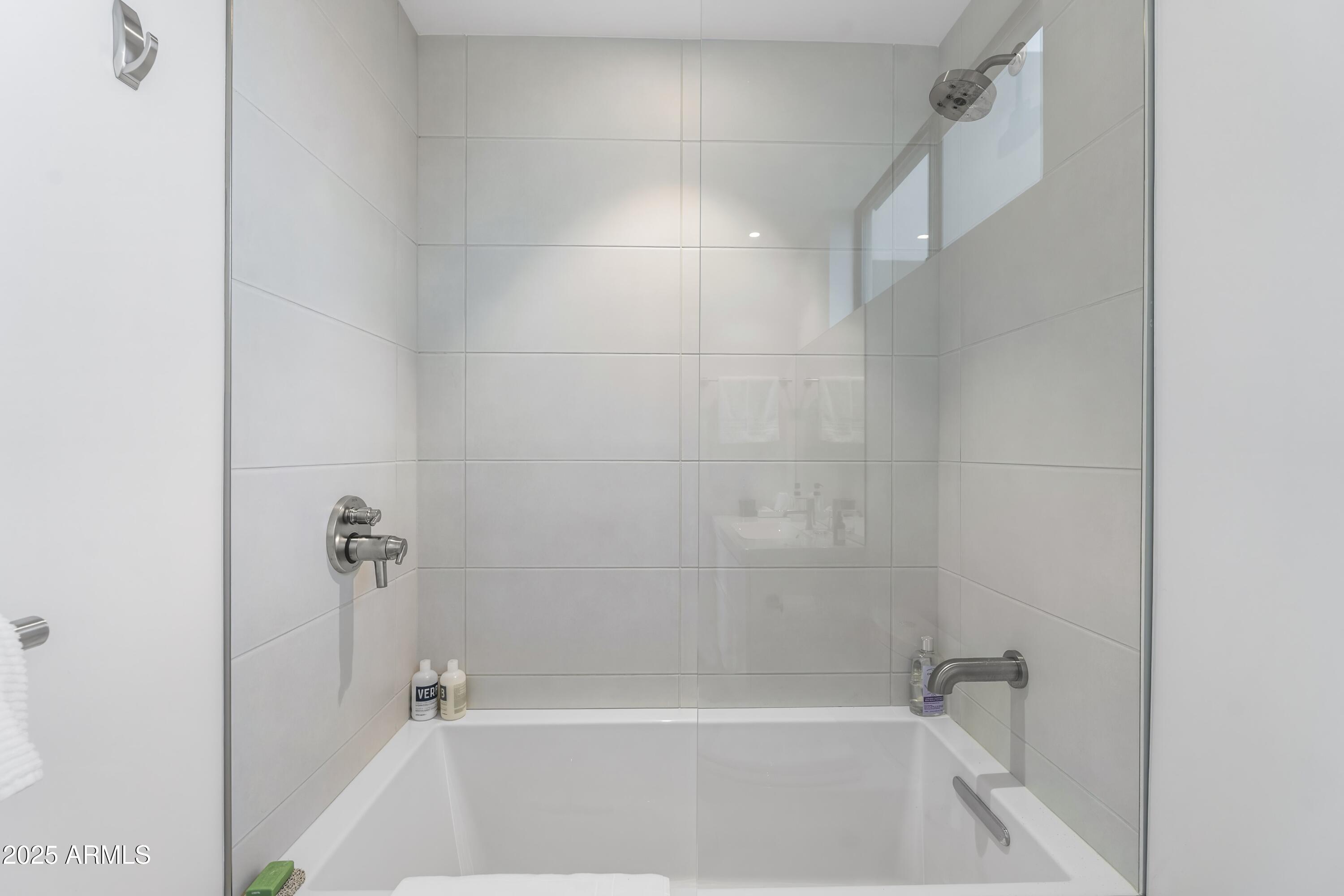 7915 East Primrose Path Carefree, AZ 85377 - Photo 52 of 55 a bathroom with a bathtub