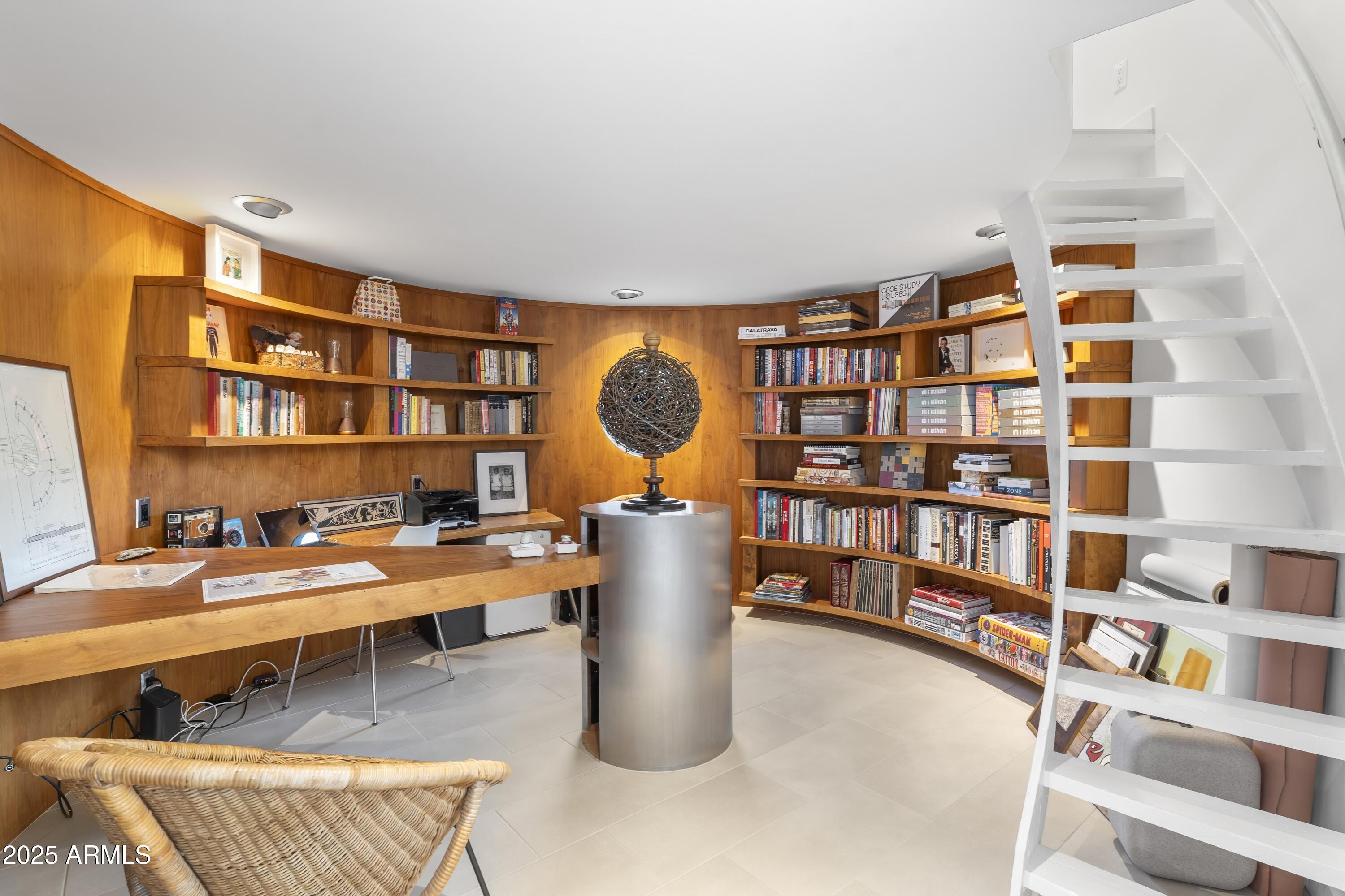 7915 East Primrose Path Carefree, AZ 85377 - Photo 8 of 55 a view of a workspace with furniture