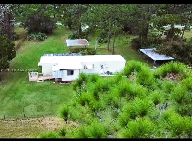 a view of a golf course with a lake