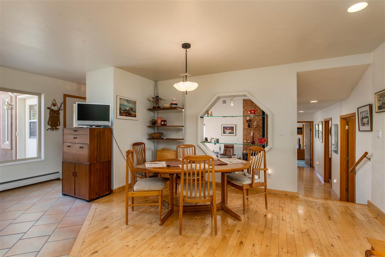18735 Northridge Road Cedaredge, CO 81413 - Photo 11 of 26 a view of a livingroom with furniture and a fireplace