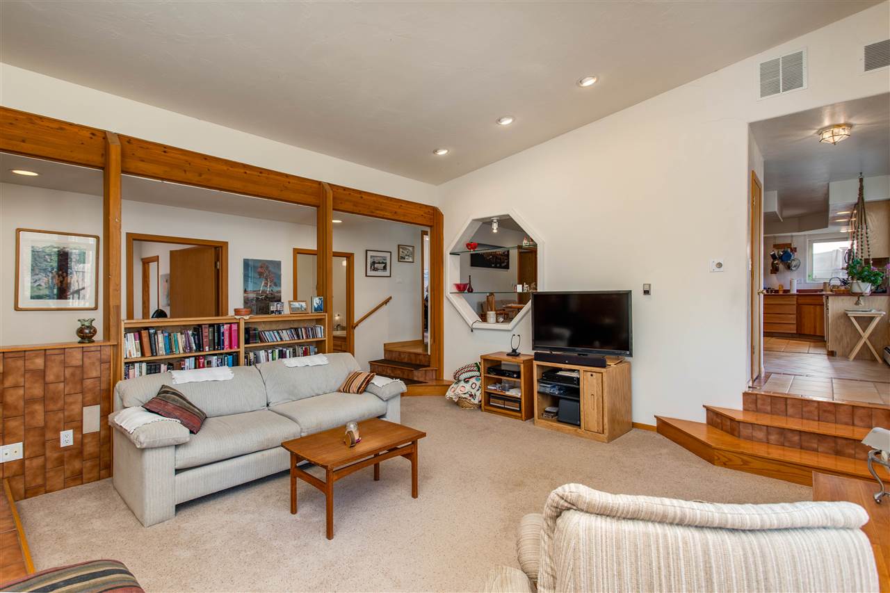 18735 Northridge Road Cedaredge, CO 81413 - Photo 15 of 26 a living room with furniture and a flat screen tv