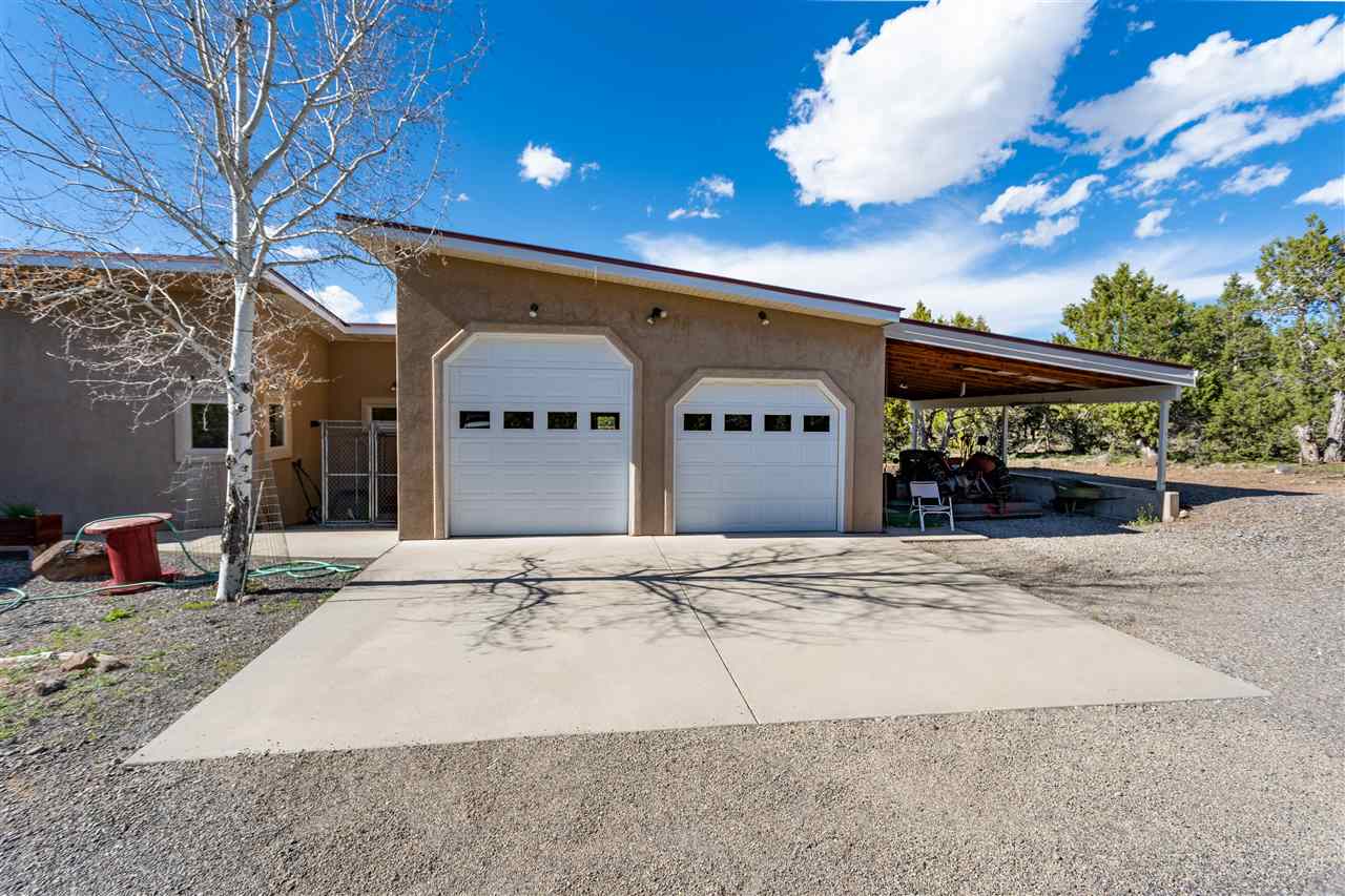 18735 Northridge Road Cedaredge, CO 81413 - Photo 2 of 26 a large building with front of it