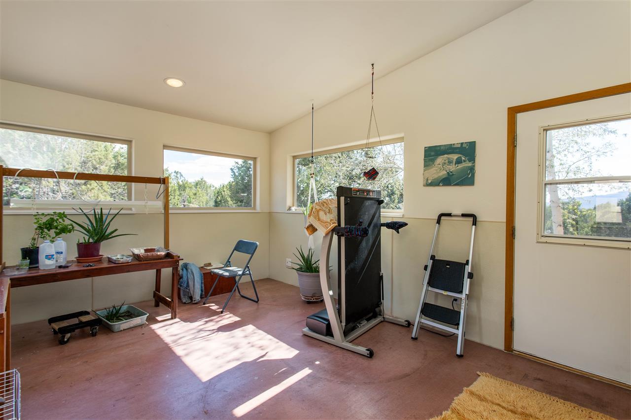 18735 Northridge Road Cedaredge, CO 81413 - Photo 25 of 26 a view of a room with gym equipment