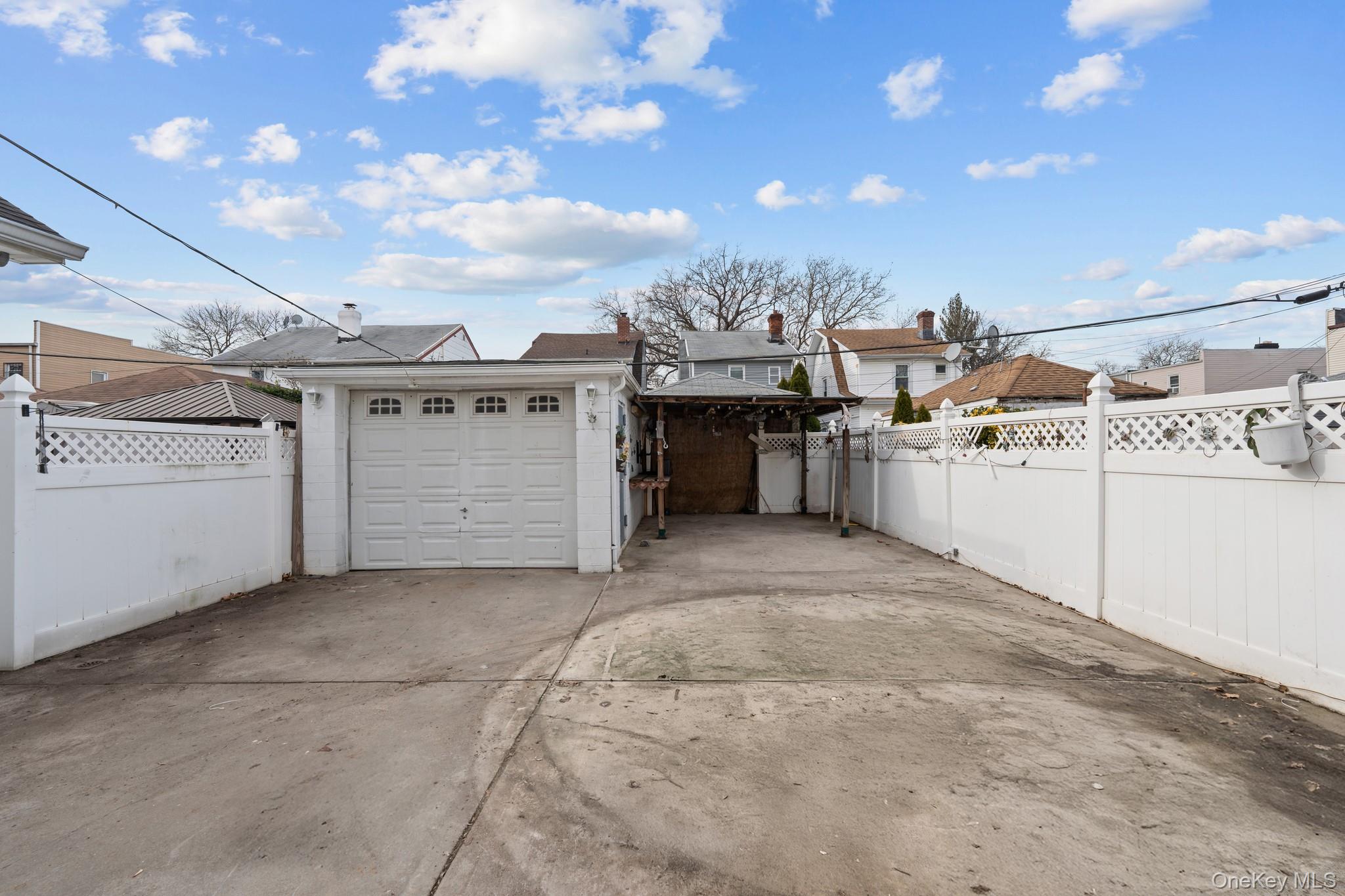 1638 East 45th Street Brooklyn, NY 11234 - Photo 14 of 16 a view of a kitchen with furniture and a kitchen