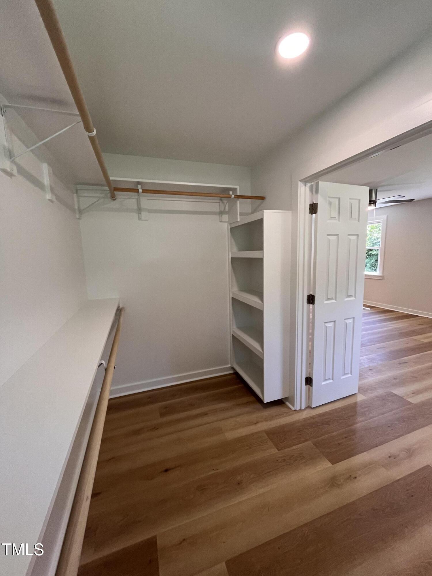6801 Holly Springs Road Raleigh, NC 27606 - Photo 23 of 34 Master 1 walk in closet