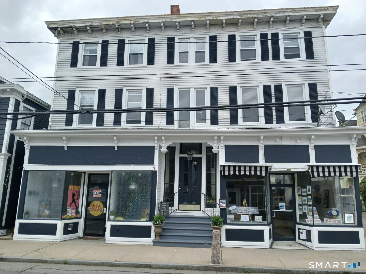 117 Water Street Stonington, CT 06378 - Photo 1 of 40 front view of a building with a street