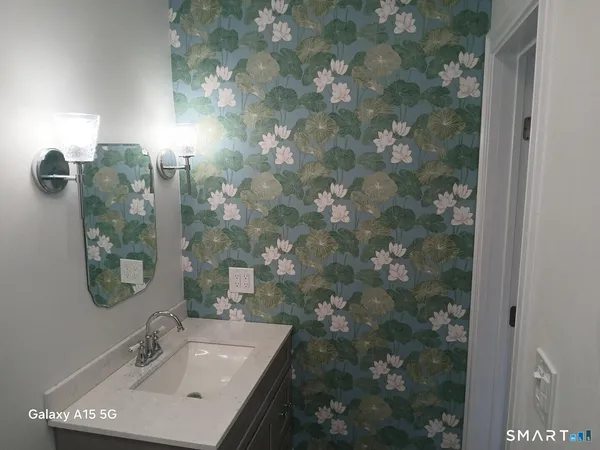 a bathroom with a shower and toilet