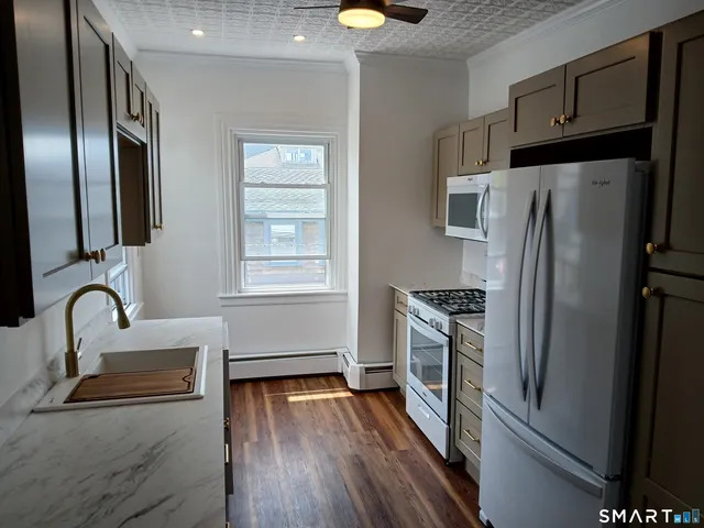 a bathroom with a bathtub and shower