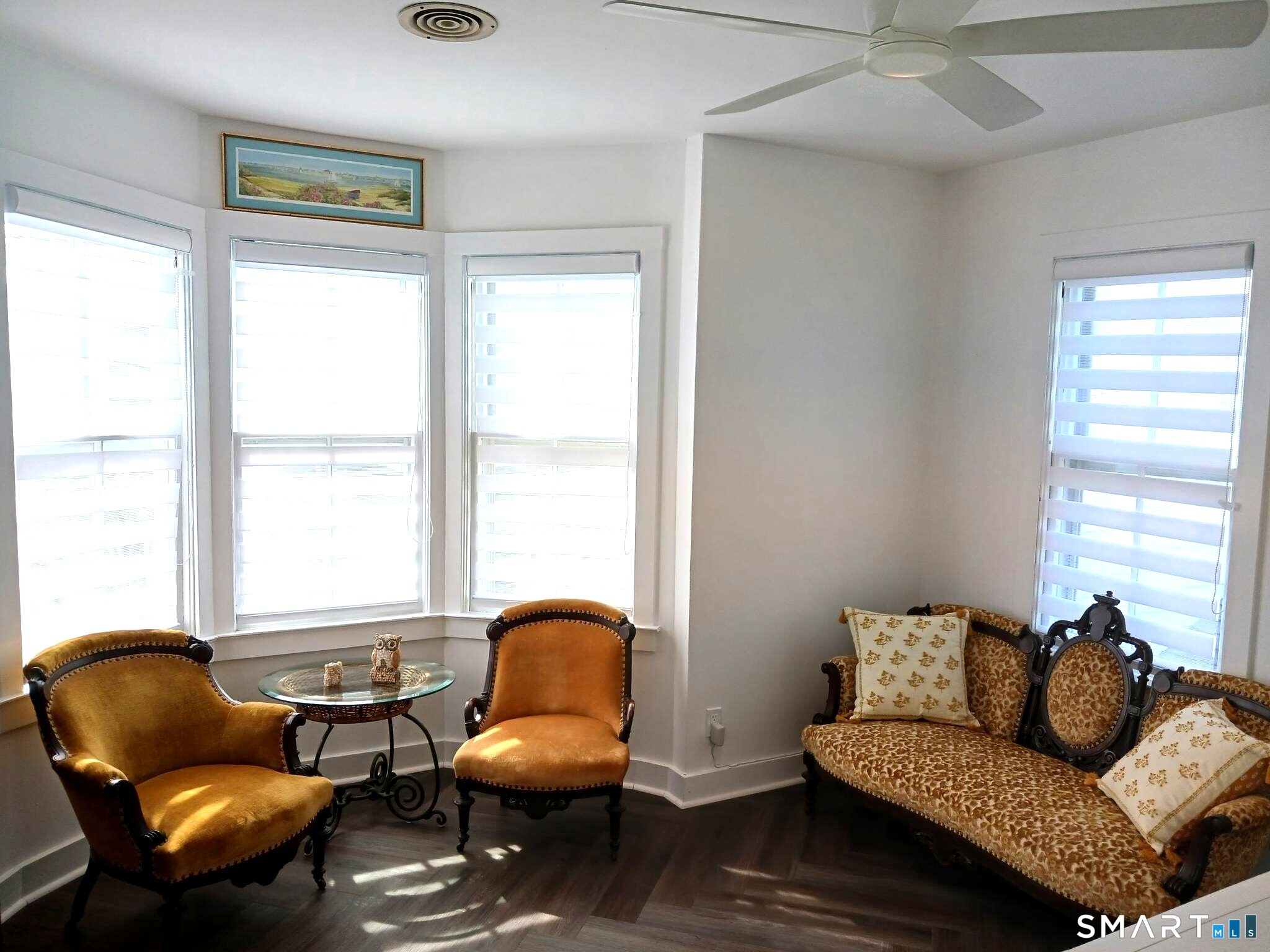 117 Water Street Stonington, CT 06378 - Photo 38 of 40 a living room with furniture and a window