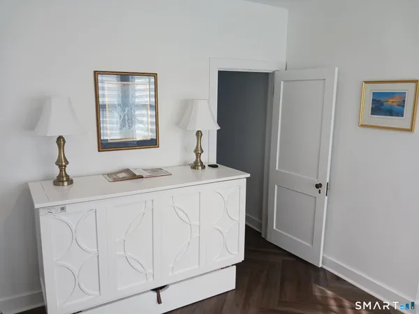 a bathroom with a shower and a sink