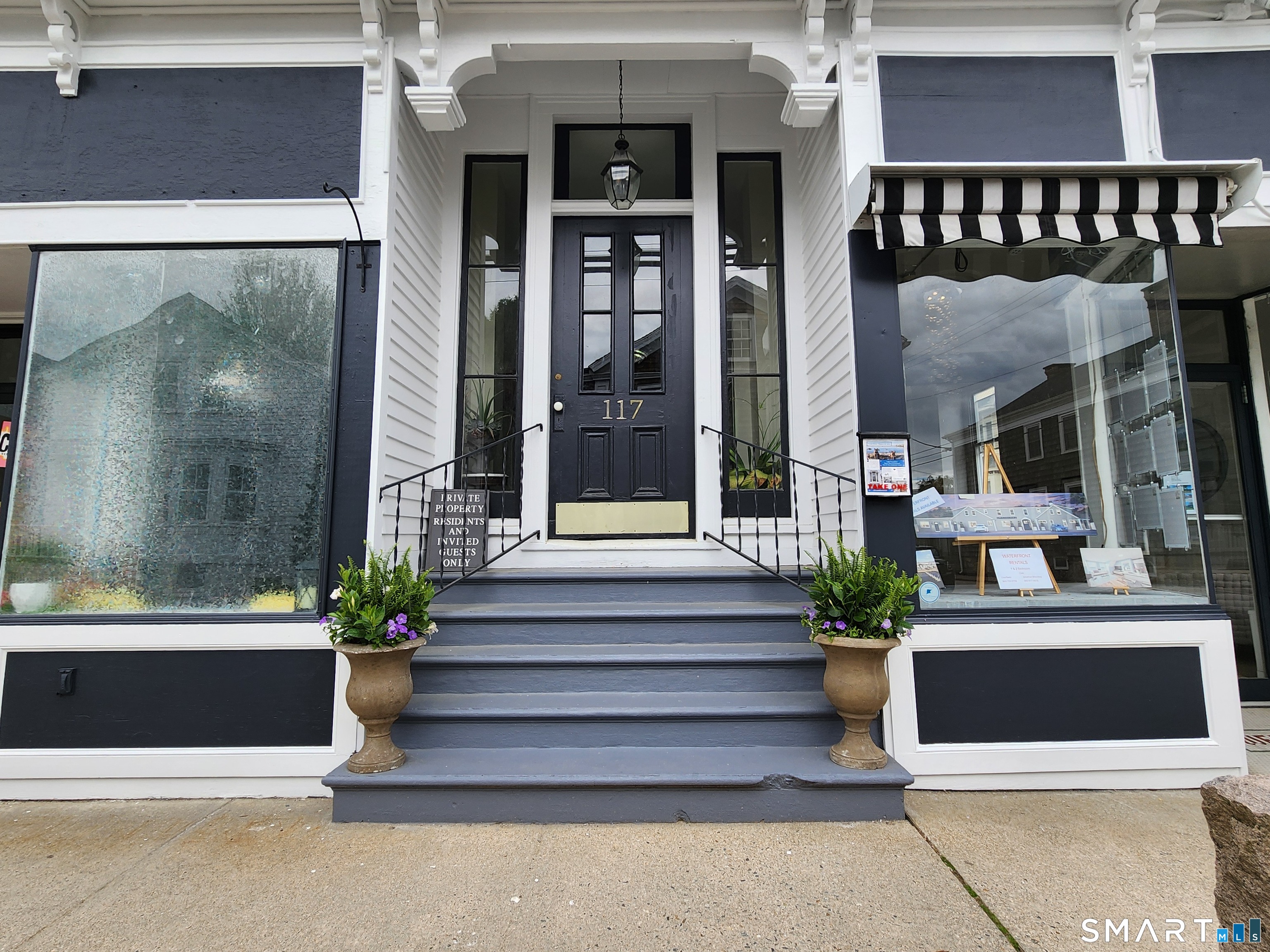 117 Water Street Stonington, CT 06378 - Photo 4 of 40 a view of entrance gate of building