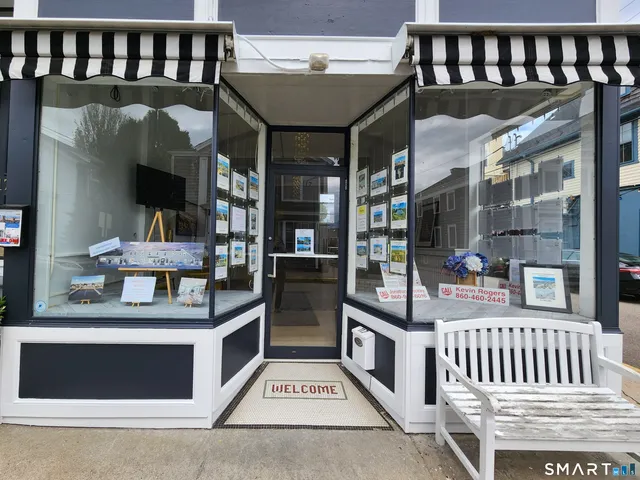 a view of living room kitchen and dining room