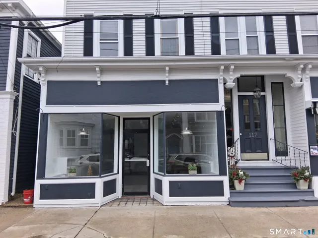 a front view of a building with a entrance