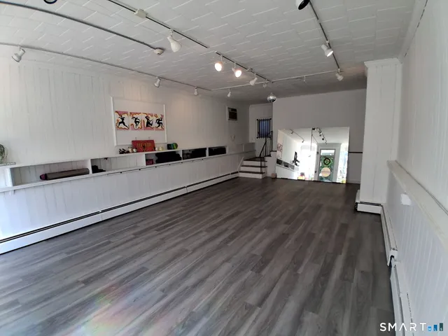 a large room with wooden floor