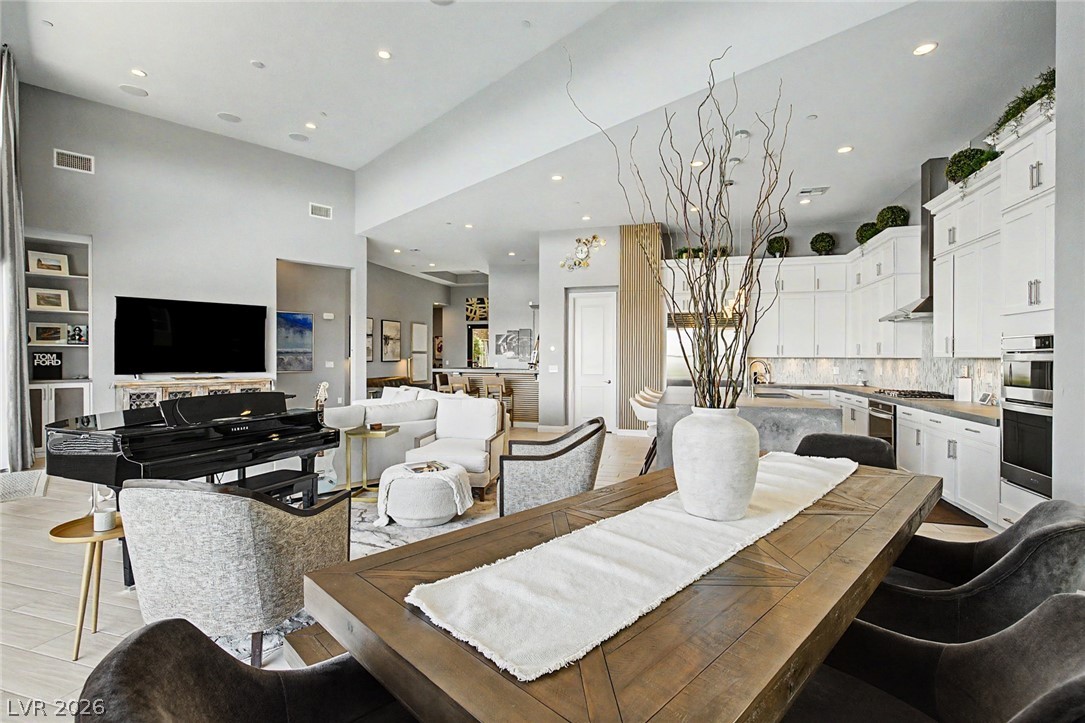 6014 Willow Ridge Court Las Vegas, NV 89135 - Photo 27 of 99 This open concept living space blends modern design with functional elegance, perfect for entertaining.