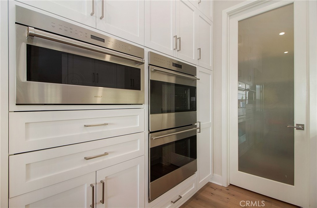 57 Sagan Way Irvine, CA 92618 - Photo 11 of 40 a stove top oven sitting inside of a kitchen
