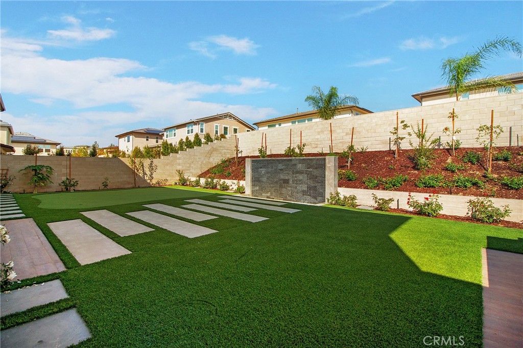 57 Sagan Way Irvine, CA 92618 - Photo 16 of 40 a view of a garden with an apartment