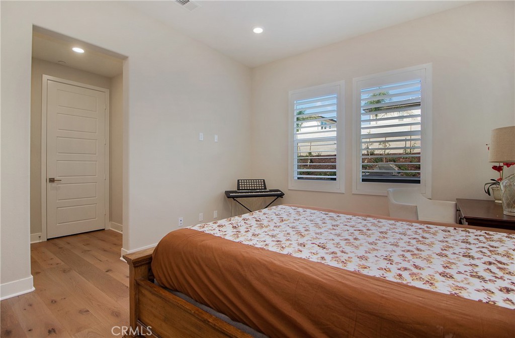 57 Sagan Way Irvine, CA 92618 - Photo 30 of 40 a bedroom with a bed and a window