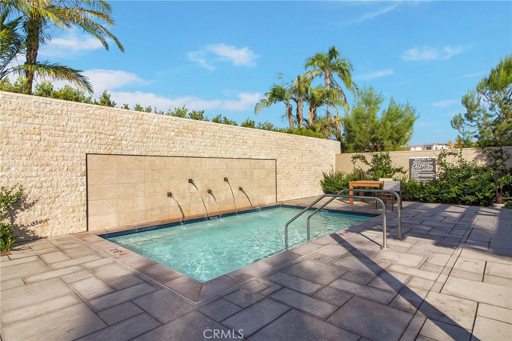 57 Sagan Way Irvine, CA 92618 - Photo 36 of 40 a backyard of a house with table and chairs