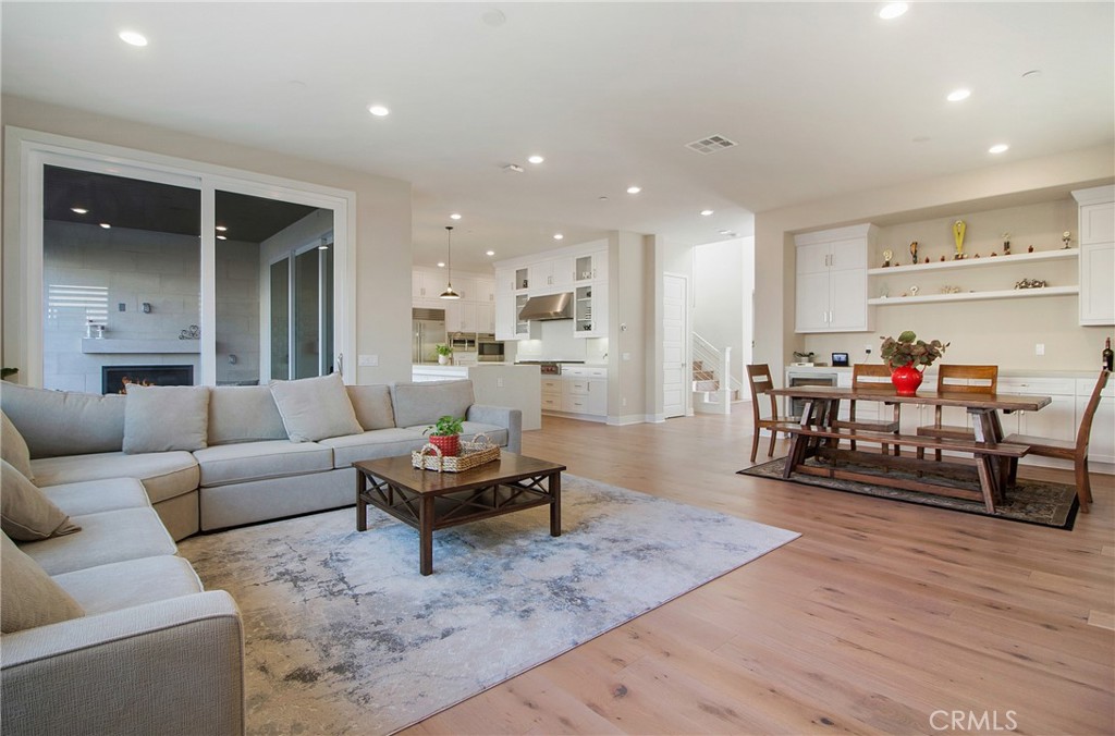 57 Sagan Way Irvine, CA 92618 - Photo 8 of 40 a living room with furniture and a wooden floor