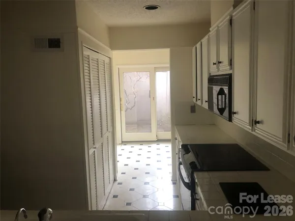 a view of a entryway of wooden floor