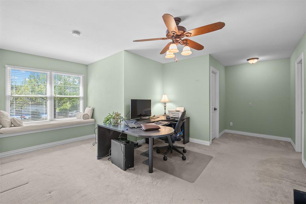 7225 Moss Ridge Road Parker, TX 75098 - Photo 13 of 40 This room features light green walls, a ceiling fan, and carpeted flooring