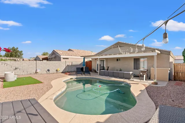 a front view of house with yard and seating area