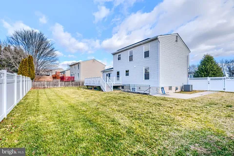 a bathroom with a sink and a yard