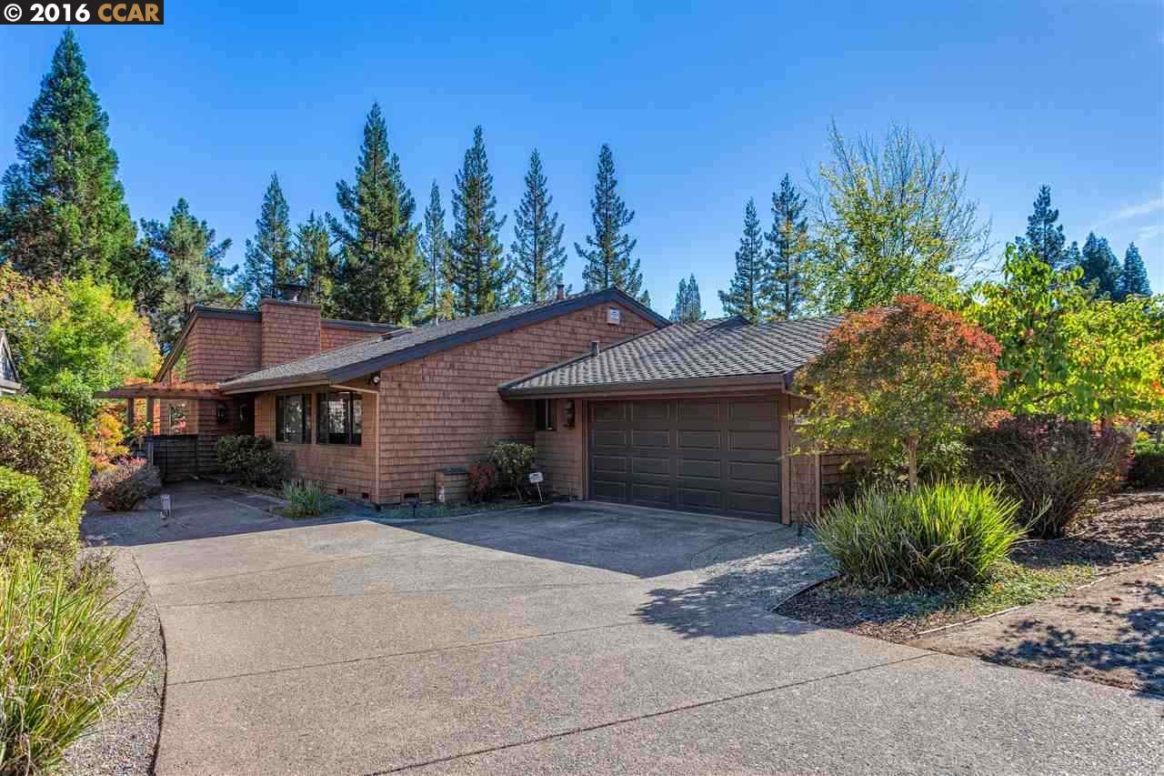 407 Ridge Gate Road Orinda, CA 94563 - Photo 1 of 1 a backyard of a house with plants and trees