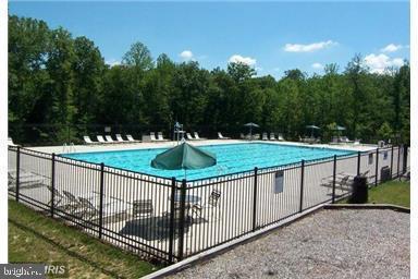 4619 Beaufont Spring Court Woodbridge, VA 22192 - Photo 30 of 42 a view of a balcony with a yard