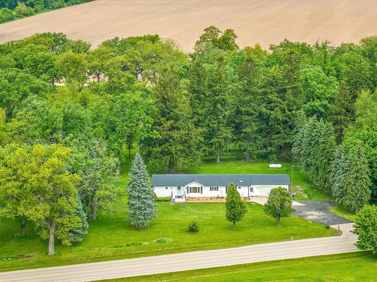 8500 Manchester Road Capron, IL 61012 - Photo 9 of 51 a view of a big yard
