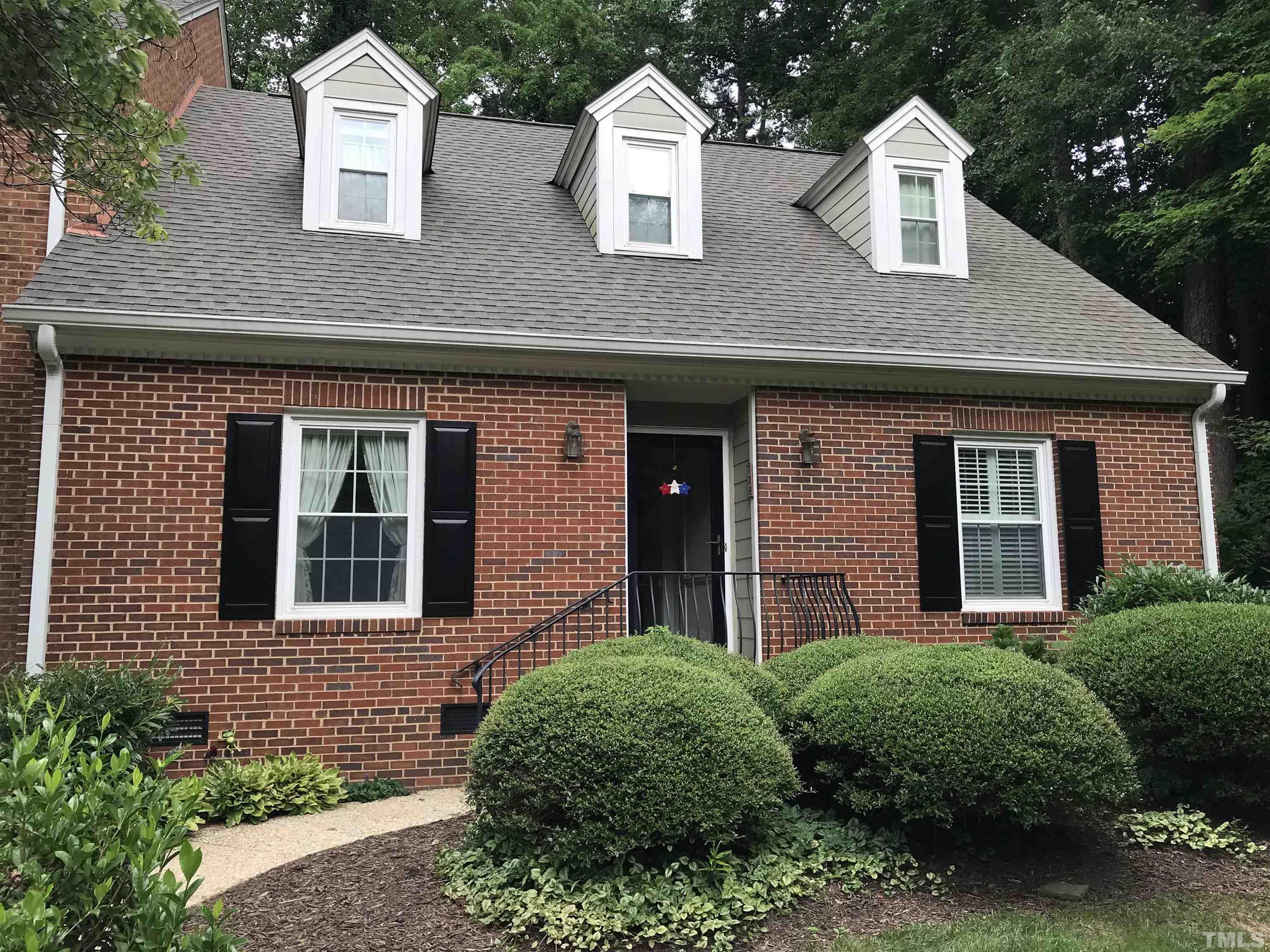 738 Weathergreen Drive Raleigh, NC 27615 - Photo 1 of 31 a front view of a house with a garden