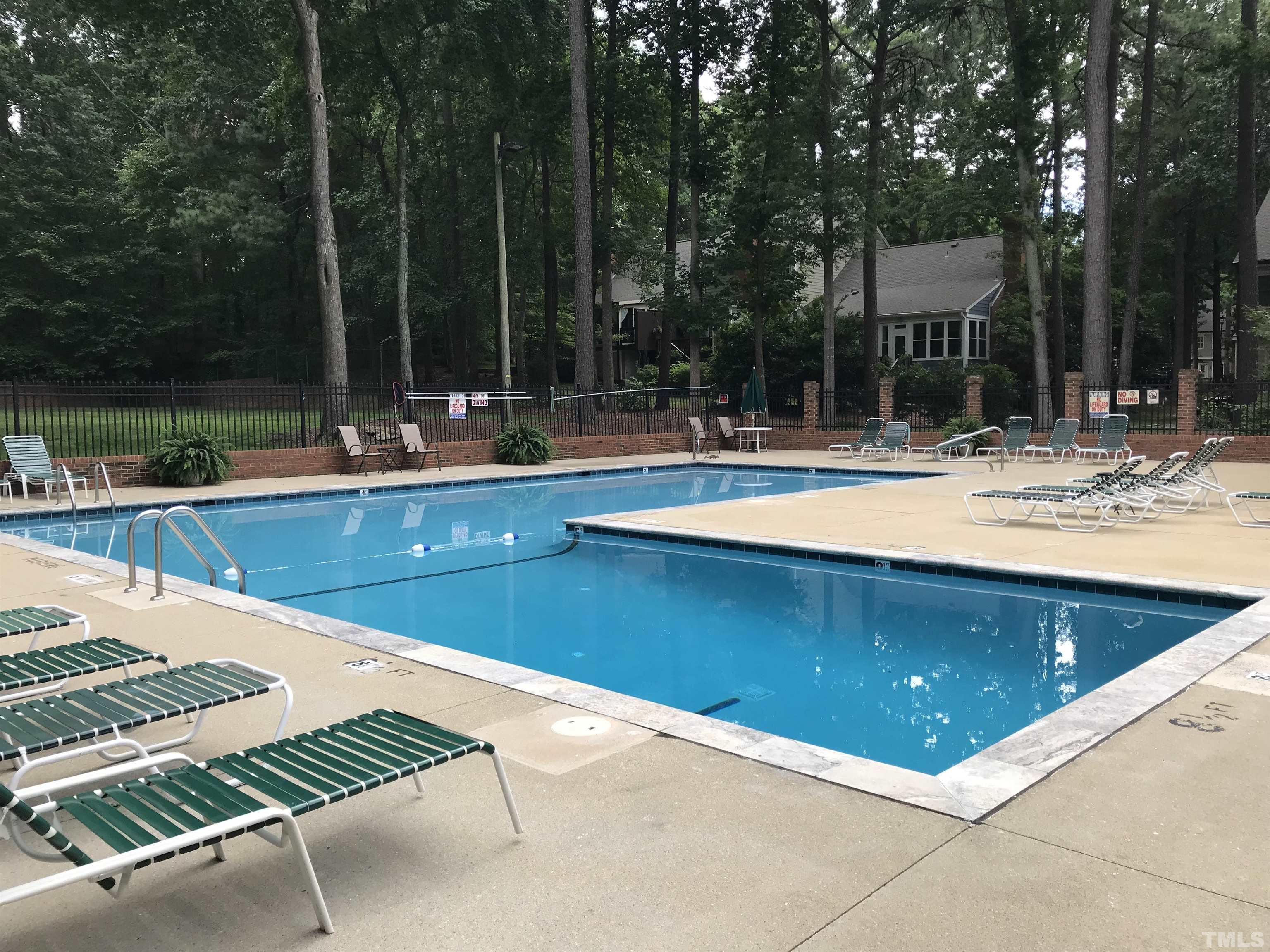 738 Weathergreen Drive Raleigh, NC 27615 - Photo 5 of 31 a view of a swimming pool with a patio