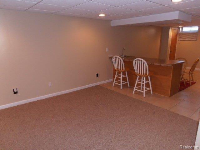 44243 Proctor Road Canton, MI 48188 - Photo 17 of 23 Finished Basement with Bar