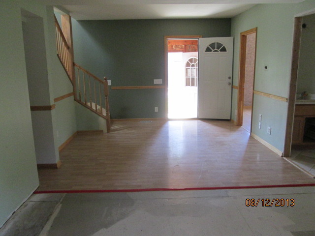 113 Garfield Road Harvard, IL 60033 - Photo 4 of 11 a view of entryway with wooden floor