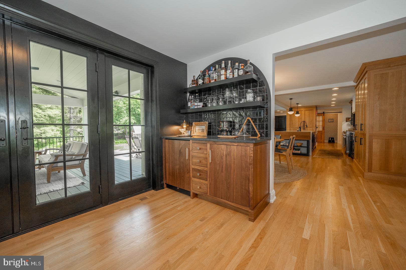 161 Hunters Lane Devon, PA 19333 - Photo 14 of 86 Wet Bar & doors to Covered Patio