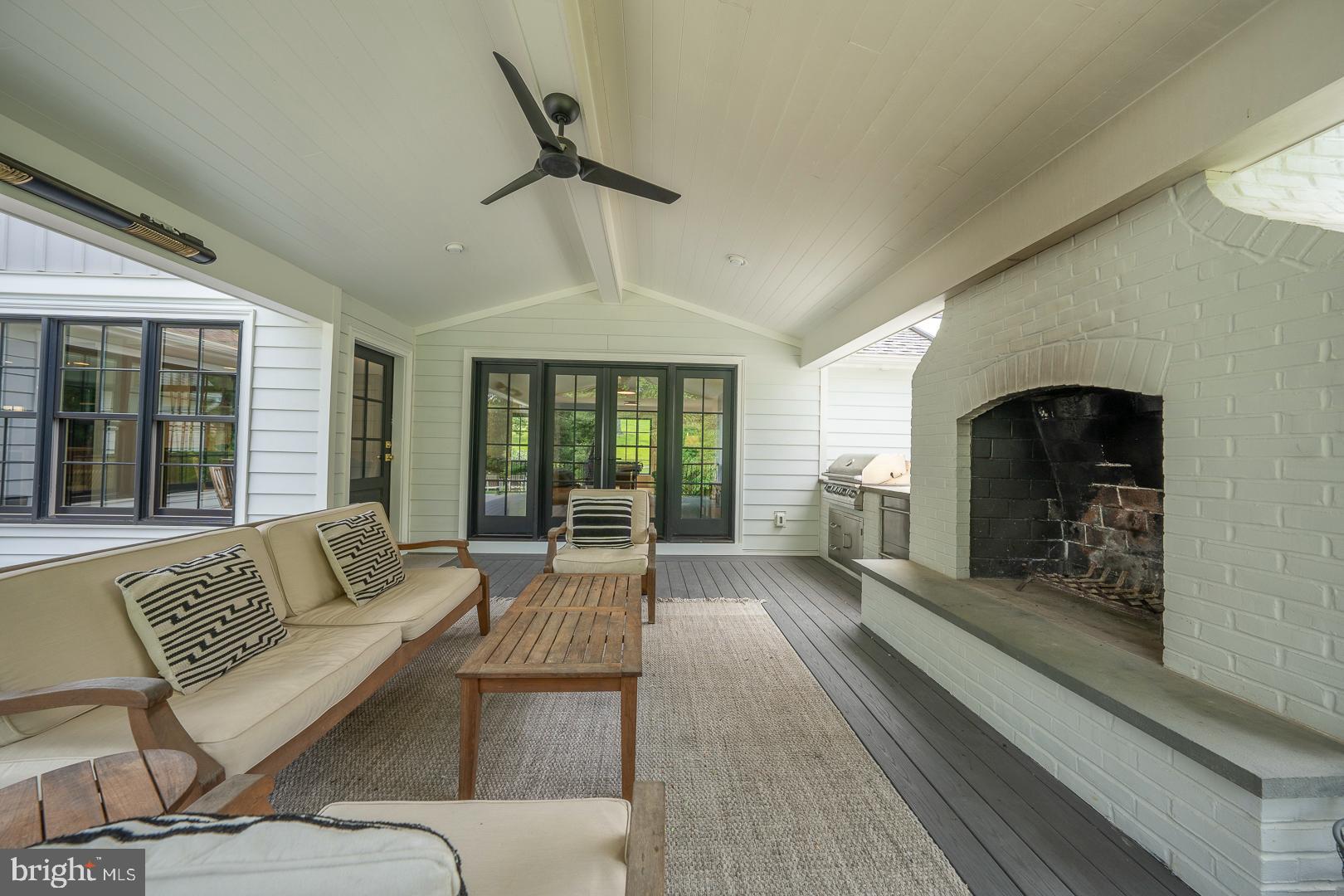 161 Hunters Lane Devon, PA 19333 - Photo 75 of 86 Covered Lounge area with fireplace & grill