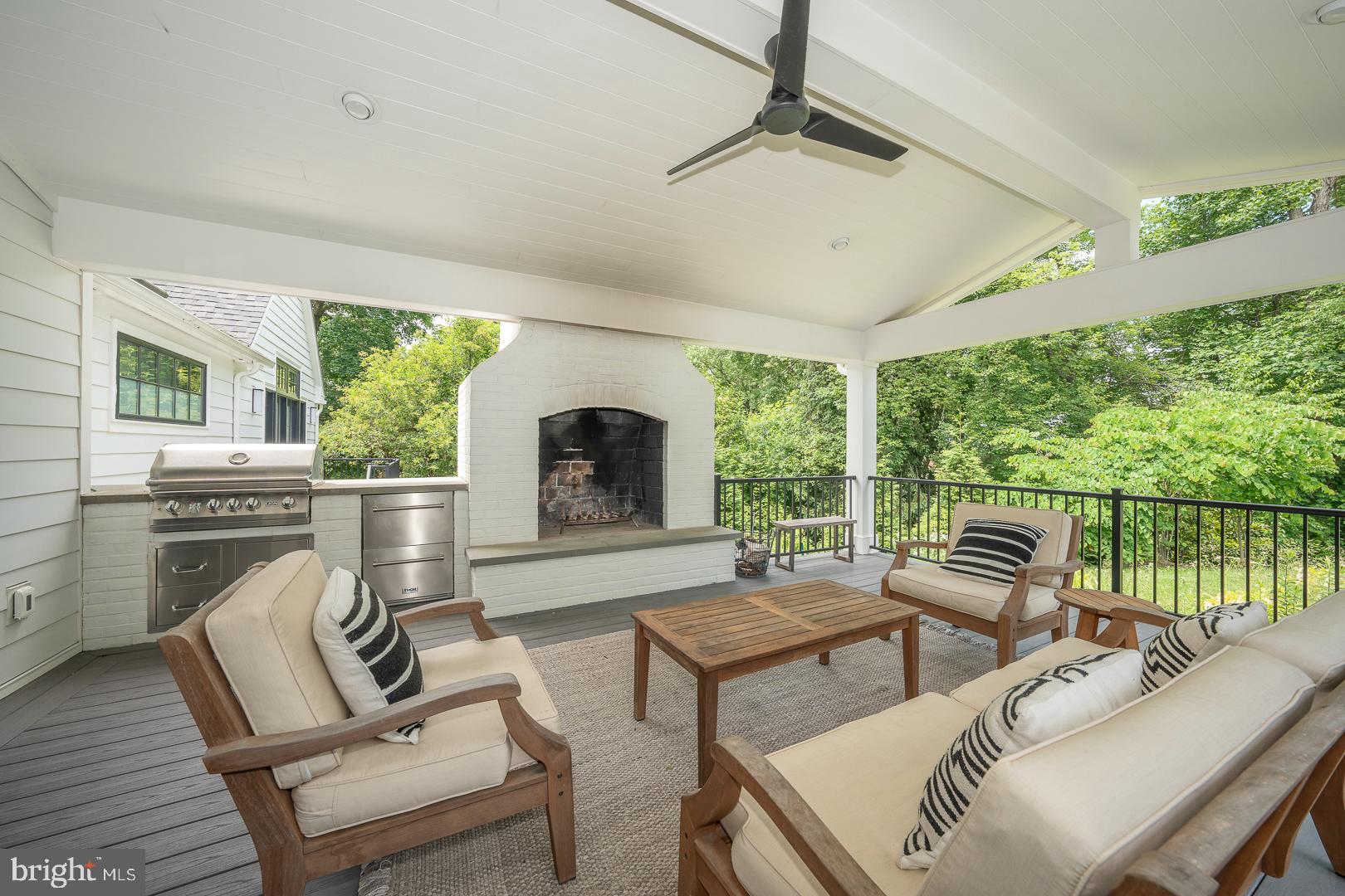 161 Hunters Lane Devon, PA 19333 - Photo 76 of 86 Covered Lounge area with fireplace & grill