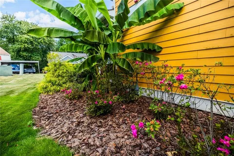 a view of balcony with wooden floor