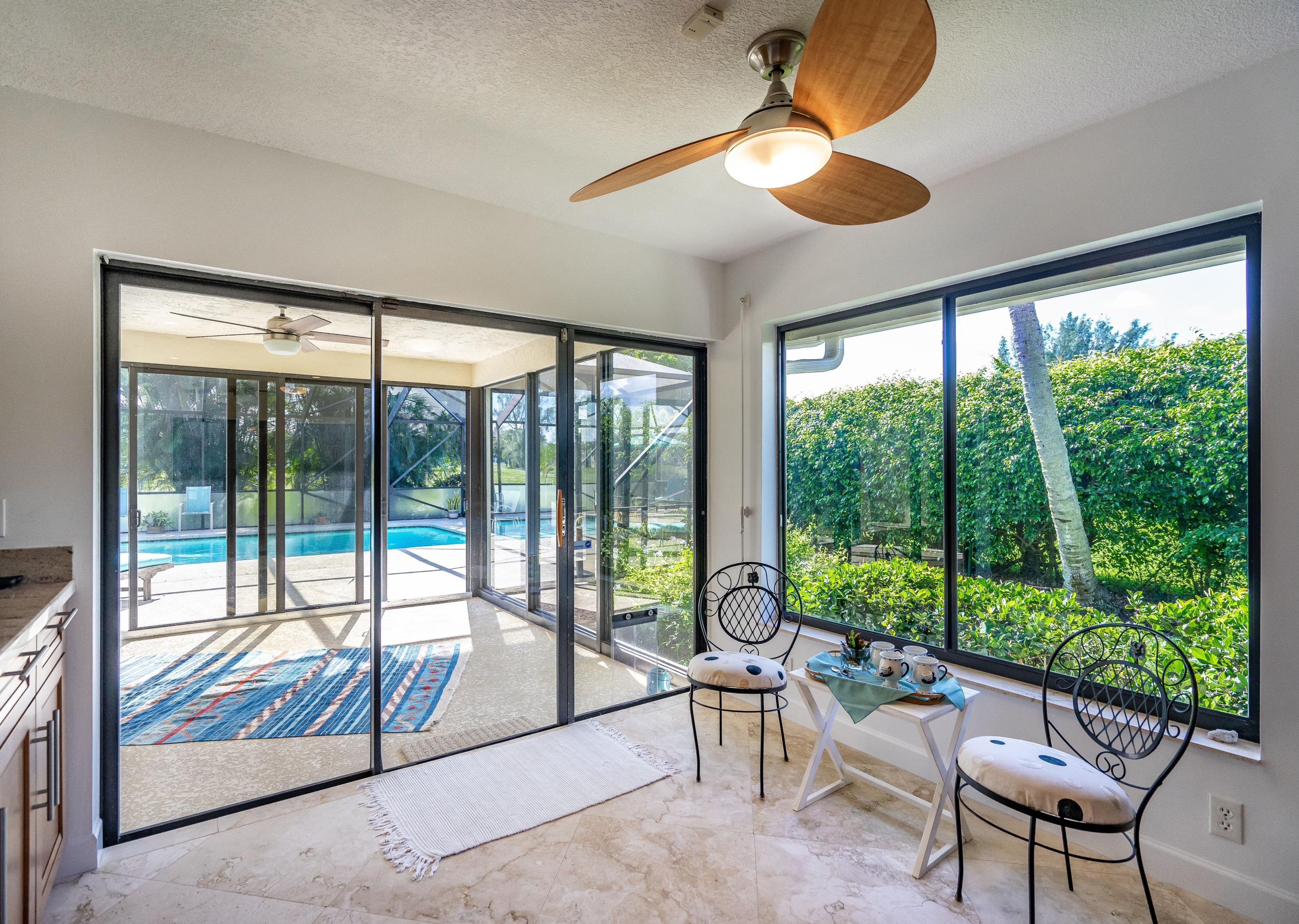 5530 Northwest 3rd Terrace Boca Raton, FL 33487 - Photo 9 of 56 Kitchen to pool
