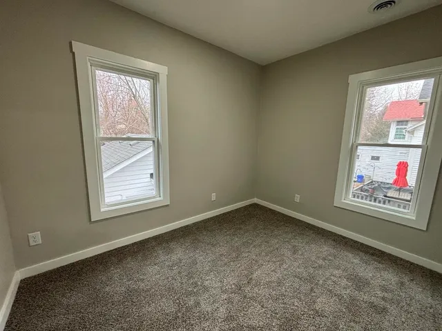 an empty room with windows