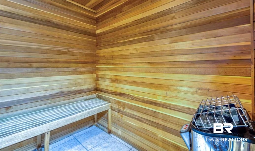 375 Plantation Road, Unit 5814 Gulf Shores, AL 36542 - Photo 22 of 31 View of sauna with tile patterned floors and wooden walls
