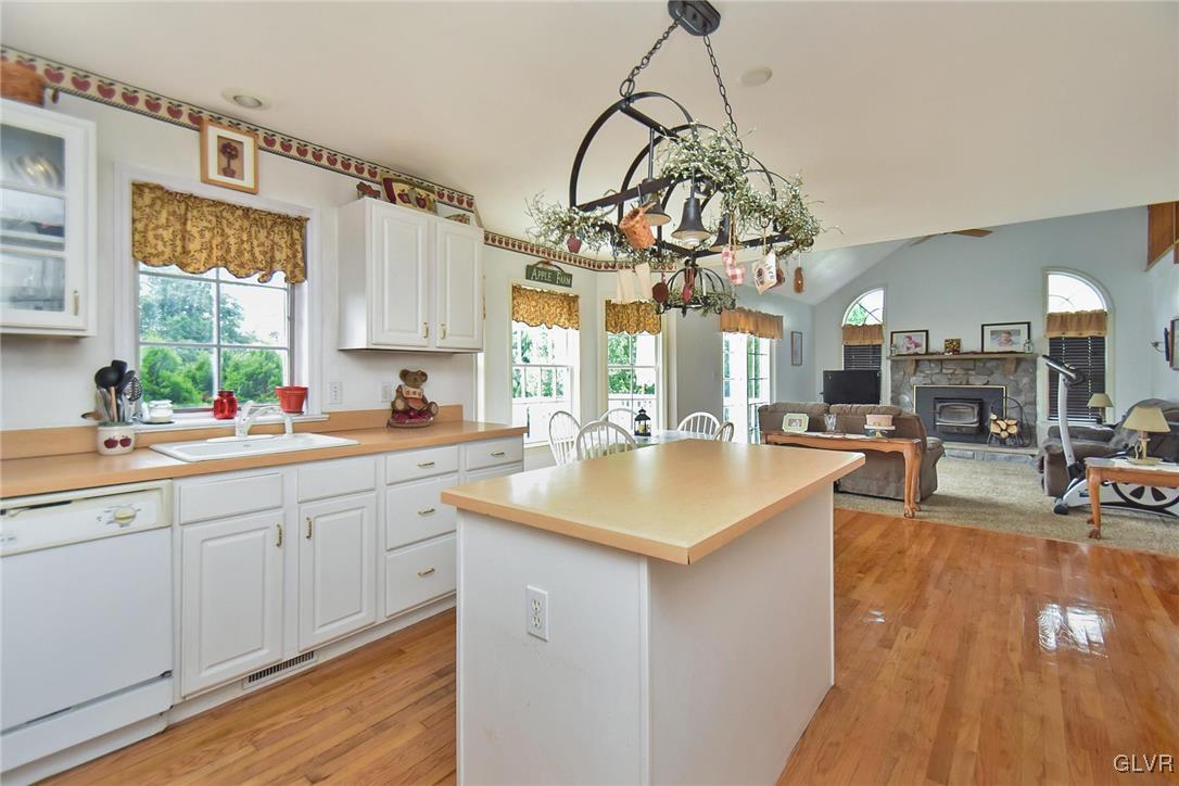 105 Hahn Road Stroudsburg, PA 18360 - Photo 12 of 45 a kitchen with a sink a counter space appliances and cabinets