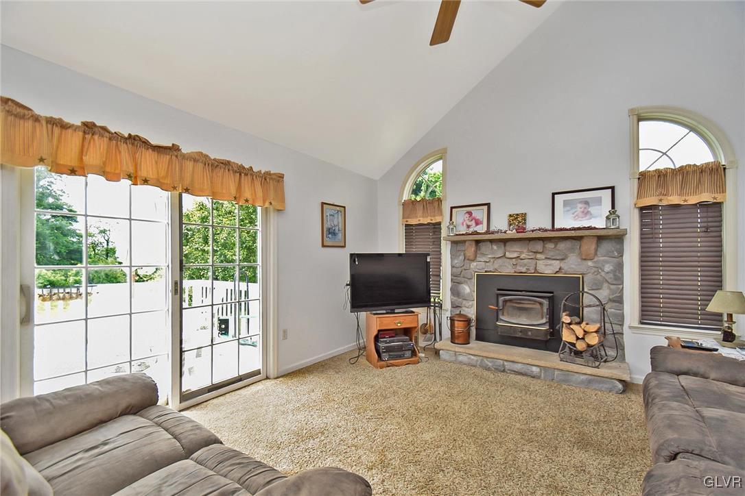 105 Hahn Road Stroudsburg, PA 18360 - Photo 18 of 45 a living room with furniture a window and a fireplace