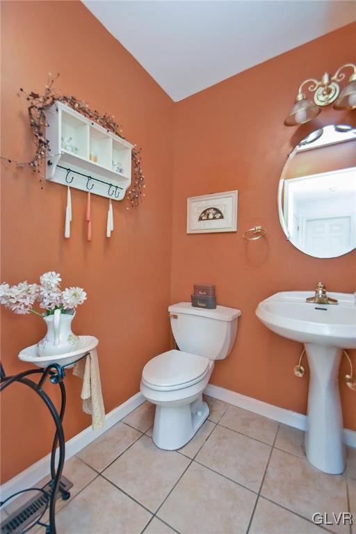 105 Hahn Road Stroudsburg, PA 18360 - Photo 20 of 45 a bathroom with a toilet a sink and mirror