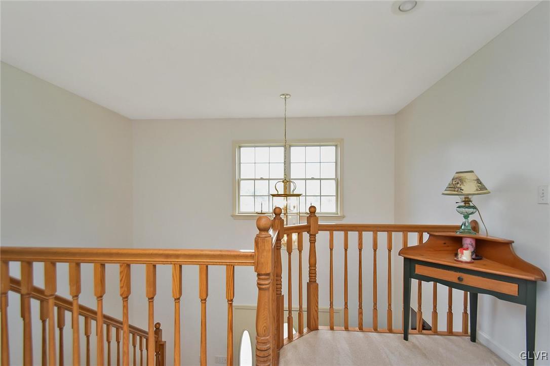 105 Hahn Road Stroudsburg, PA 18360 - Photo 24 of 45 a view of hallway with a chandelier